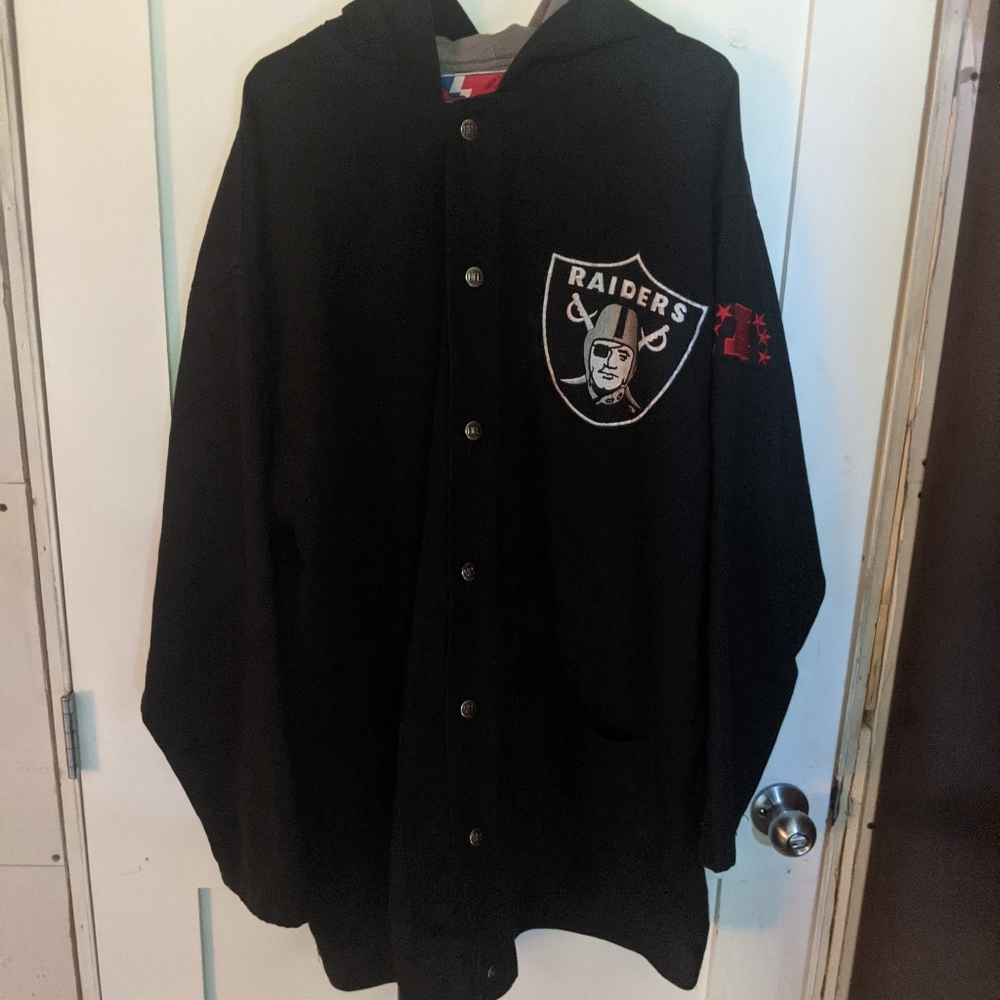 Vintage 90's Oakland Raiders hooded jacket Pro Player size L but fits big.
